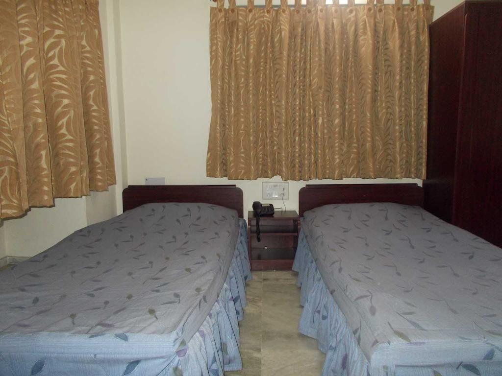 Fabexpress Harry Inn Calcutta Chambre photo