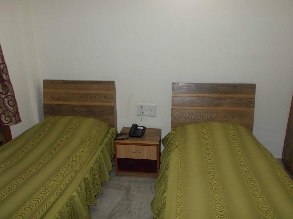 Fabexpress Harry Inn Calcutta Chambre photo