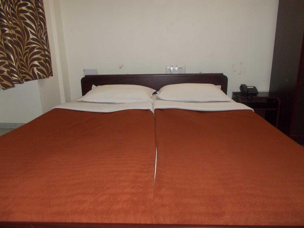 Fabexpress Harry Inn Calcutta Chambre photo